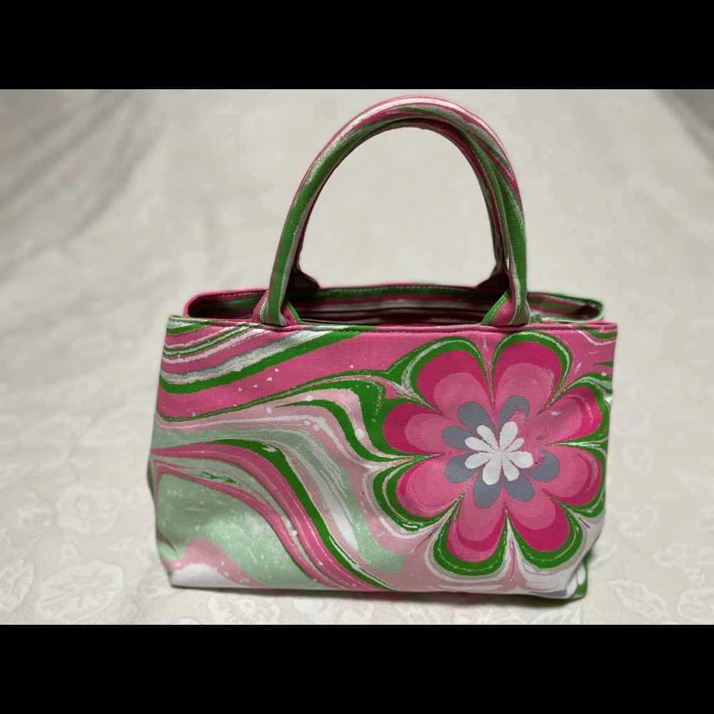 Estée Lauder floral purse/hand bag.